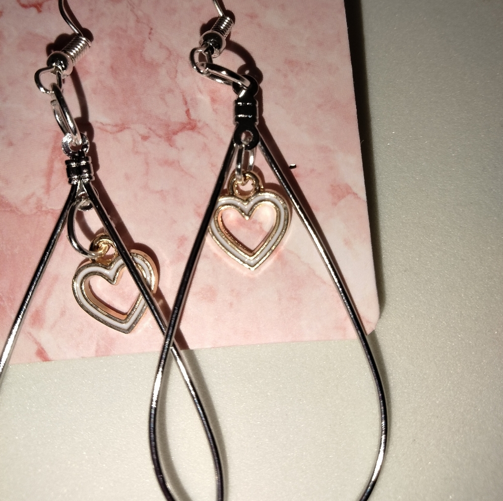 White hearts inside of sterling silver teardrops
